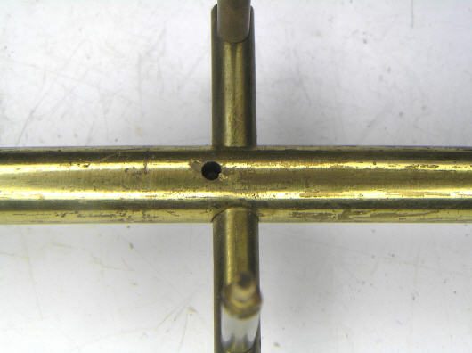 A Bulle part with a crude rivet made from a nail
